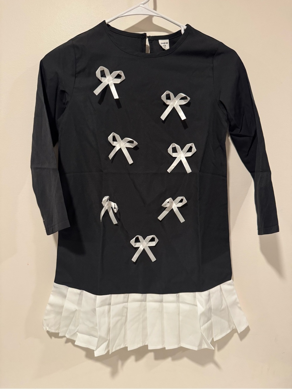 SHEIN Kids Black Dress with White Bow Accents and Pleated Hem 7Y